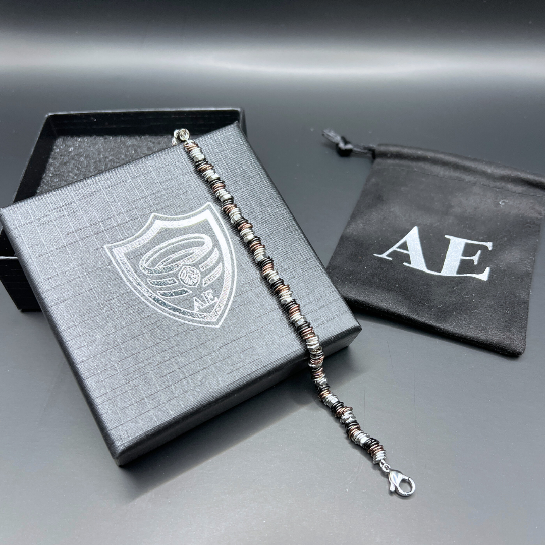 Industrial Torque bracelet variant displayed with Armoured Elegance gift box and pouch