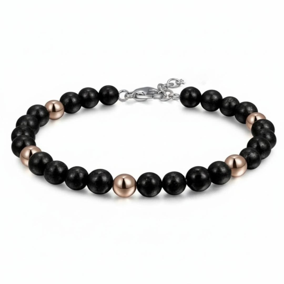 Auric Lineage Shadow edition — black 6mm bead bracelet with gold accents and stainless steel clasp.