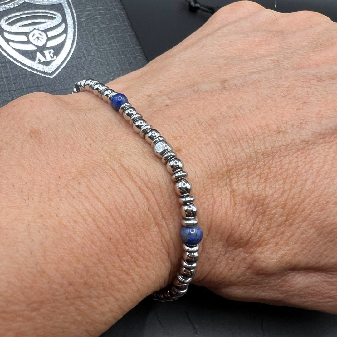 Close-up of Midnight Pulse bracelet showing intricate bead details and blue stones on wrist