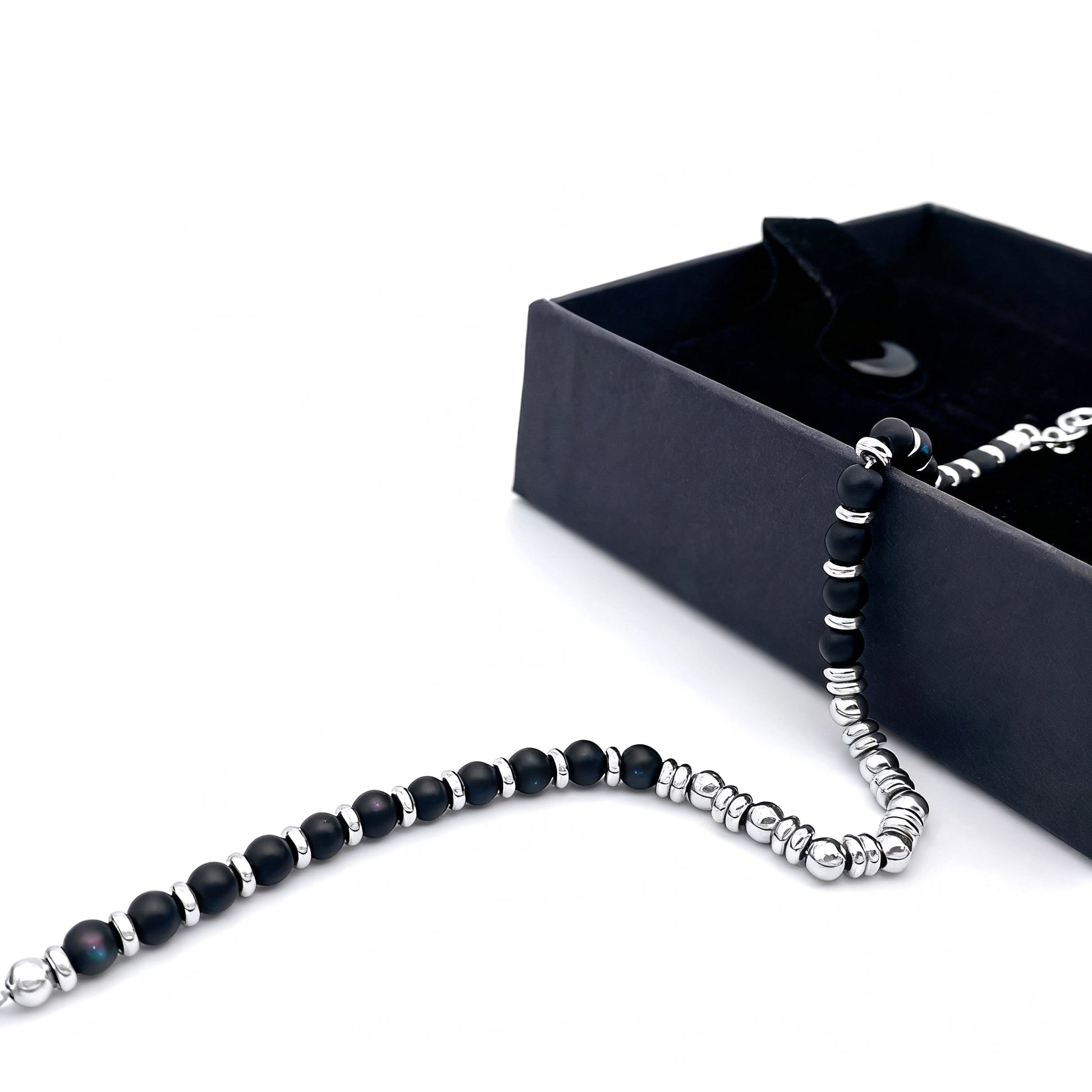 Nightfall Luxe bracelet presented beside luxury gift box, combining elegant presentation with premium craftsmanship.