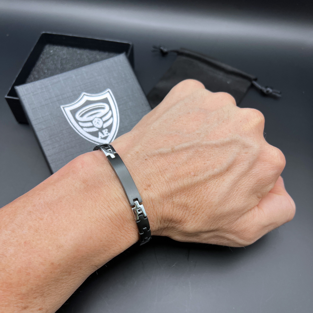 Shadow Sentinel black stainless steel bracelet worn on wrist showing slim profile and cubic zirconia detail