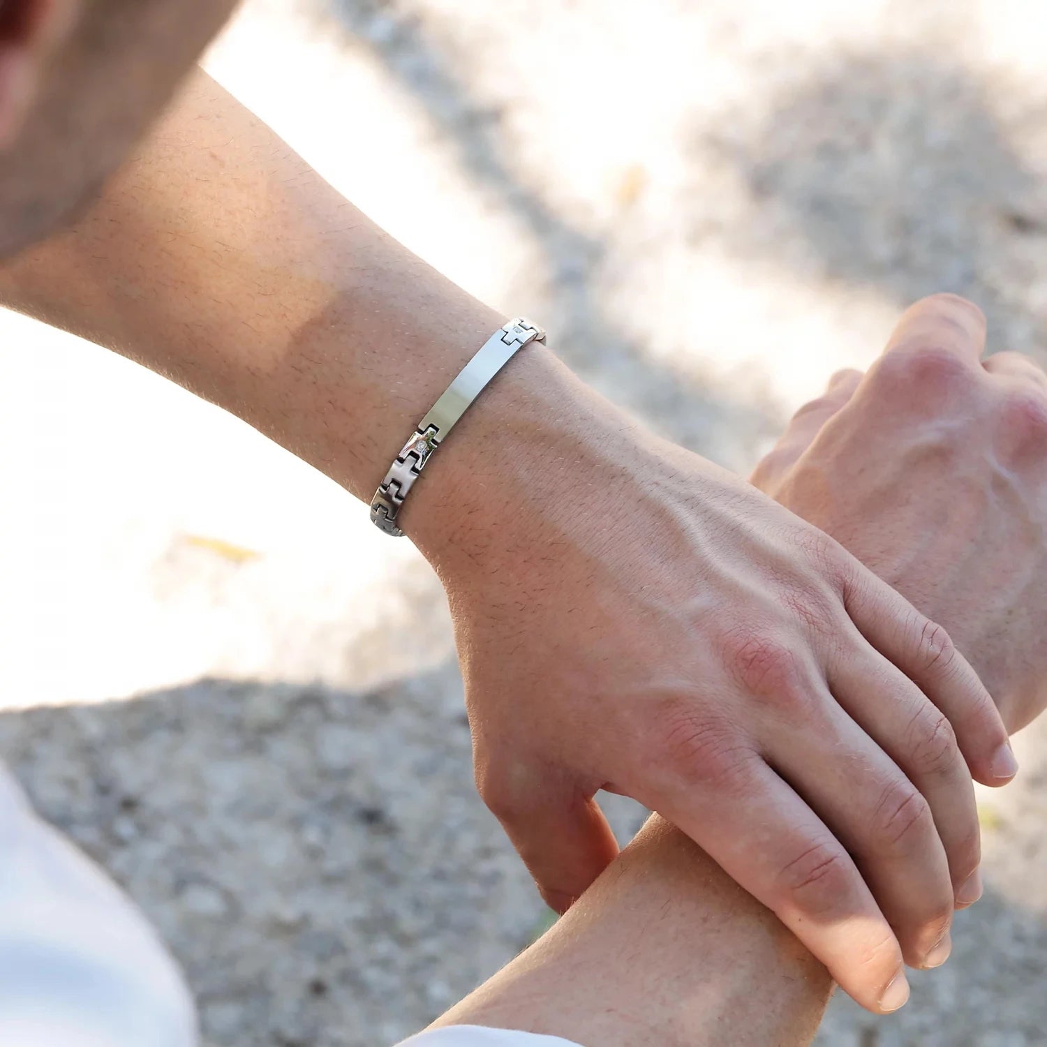 Steel Sentinel silver bracelet worn outdoors in natural light