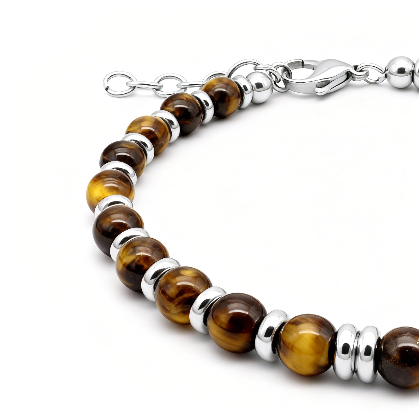 Close-up of Tiger’s Spirit bracelet showcasing tiger eye beads with golden-brown tones and high-polish stainless-steel spacers.