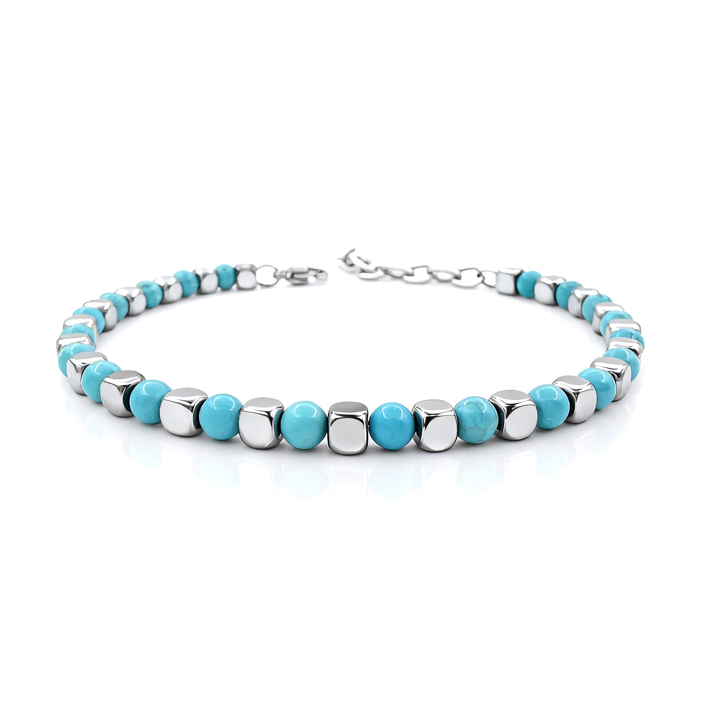 Luxury men’s Turquoise Rhythm bracelet featuring polished turquoise beads and stainless-steel cube spacers, symbolizing calm strength and refined style.
