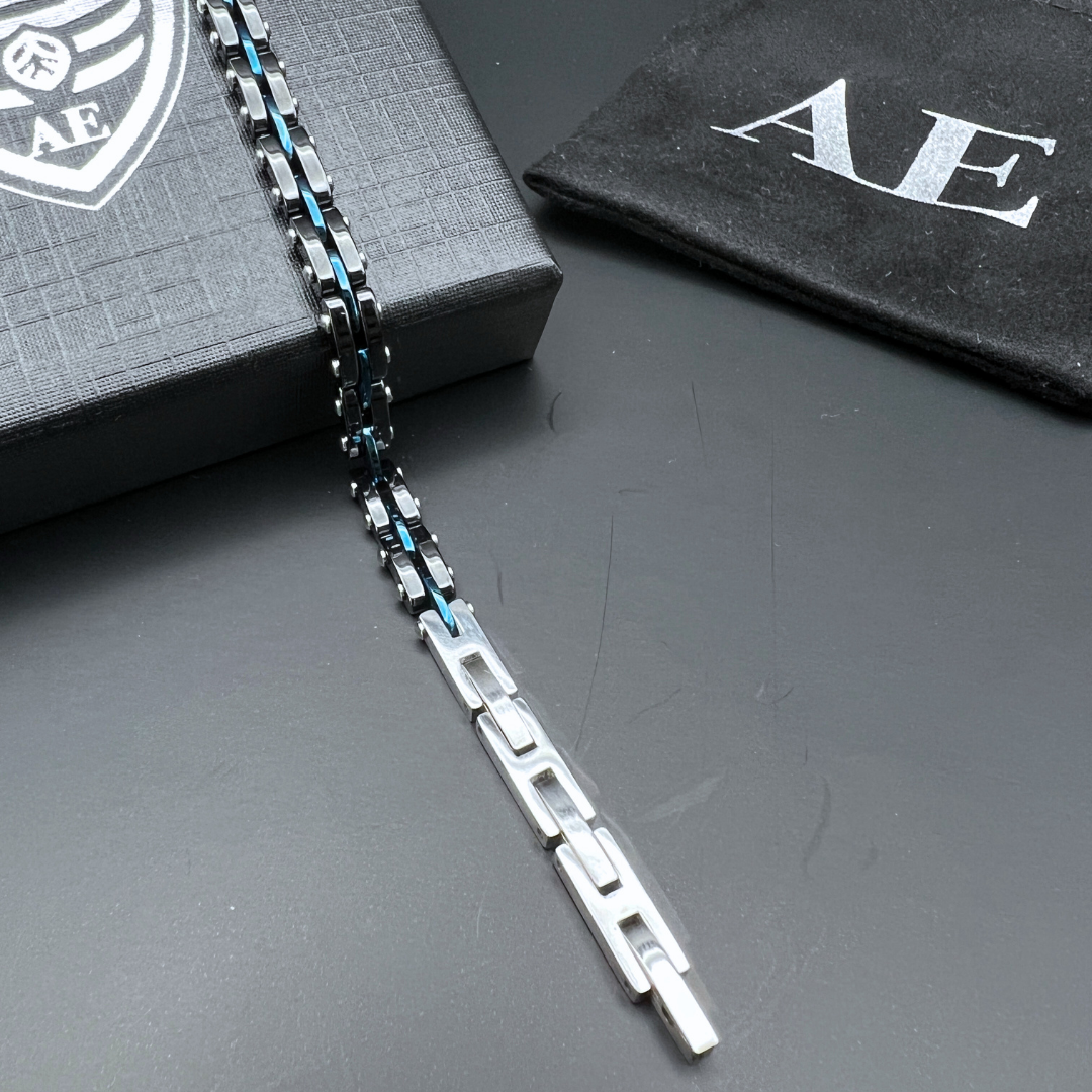 Velocity Blue Surge bracelet open clasp detail showing removable links for custom fit.